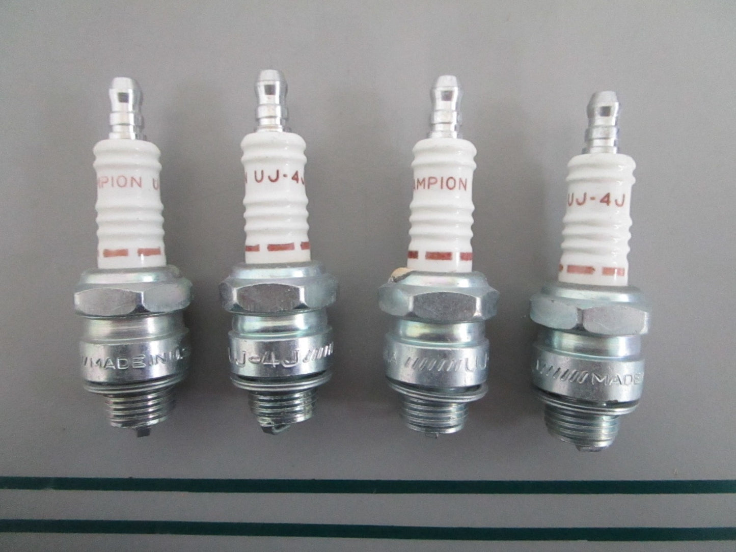 NEW OEM (LOT OF 4) UJ-4J Champion Spark Plug 0820