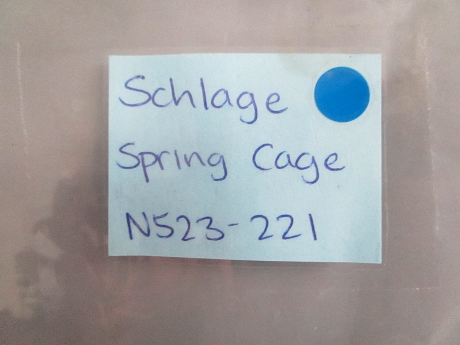 NEW OEM N523-221 Schlage Spring Cage 0820