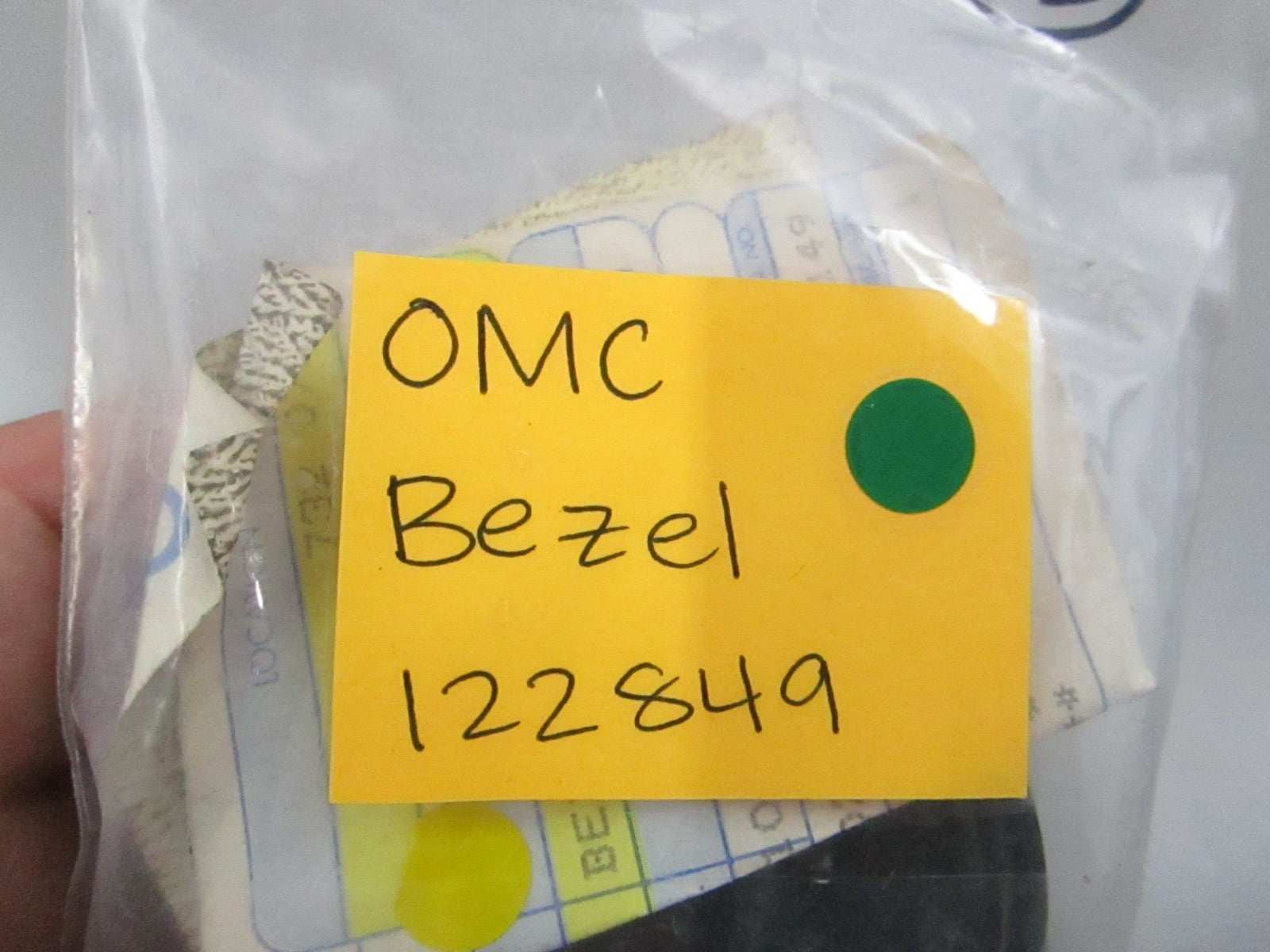 NEW OEM 122849 0122849 OMC Johnson Evinrude Bezel 0810