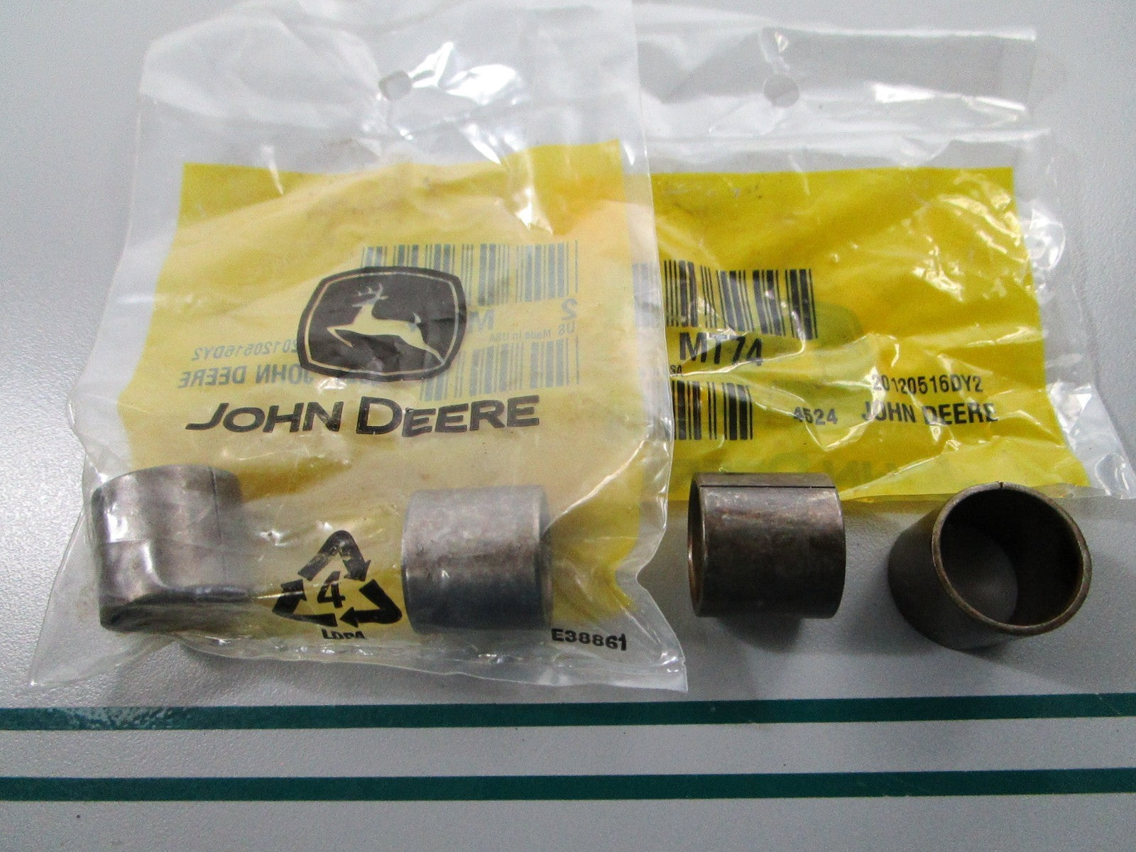 NEW OEM (LOT OF 2) MT74 John Deere 2 Bushing Set 0810