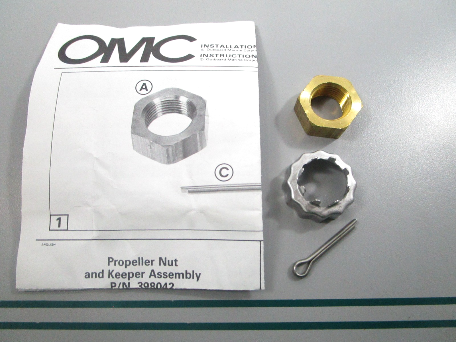 NEW OEM 398042 0398042 OMC Johnson Evinrude Prop Nut & Keeper 0810
