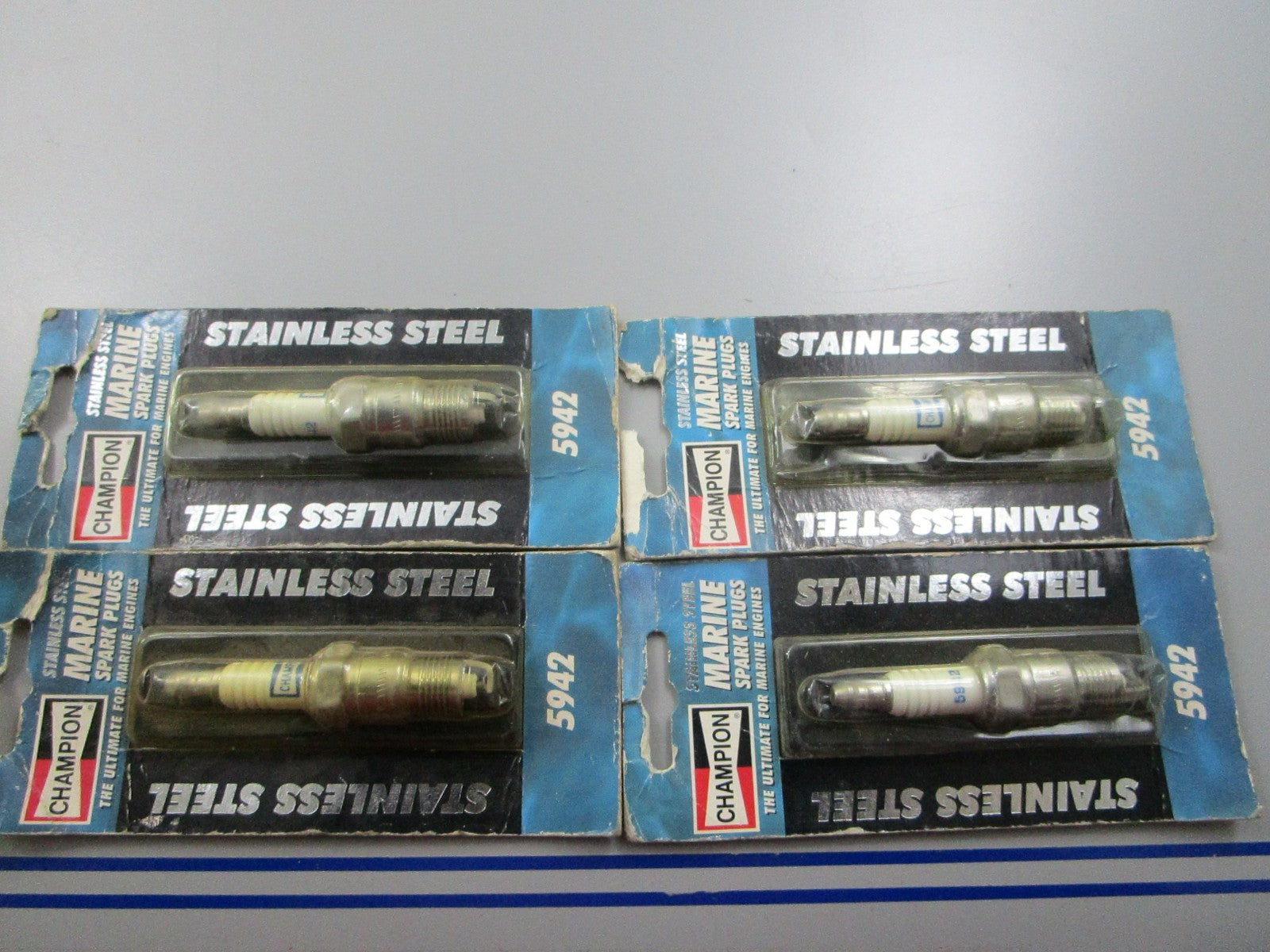 *NEW* (LOT OF 4) 0810 Champion Spark Plug 5942 Replaces: RV91MC RV15YC4