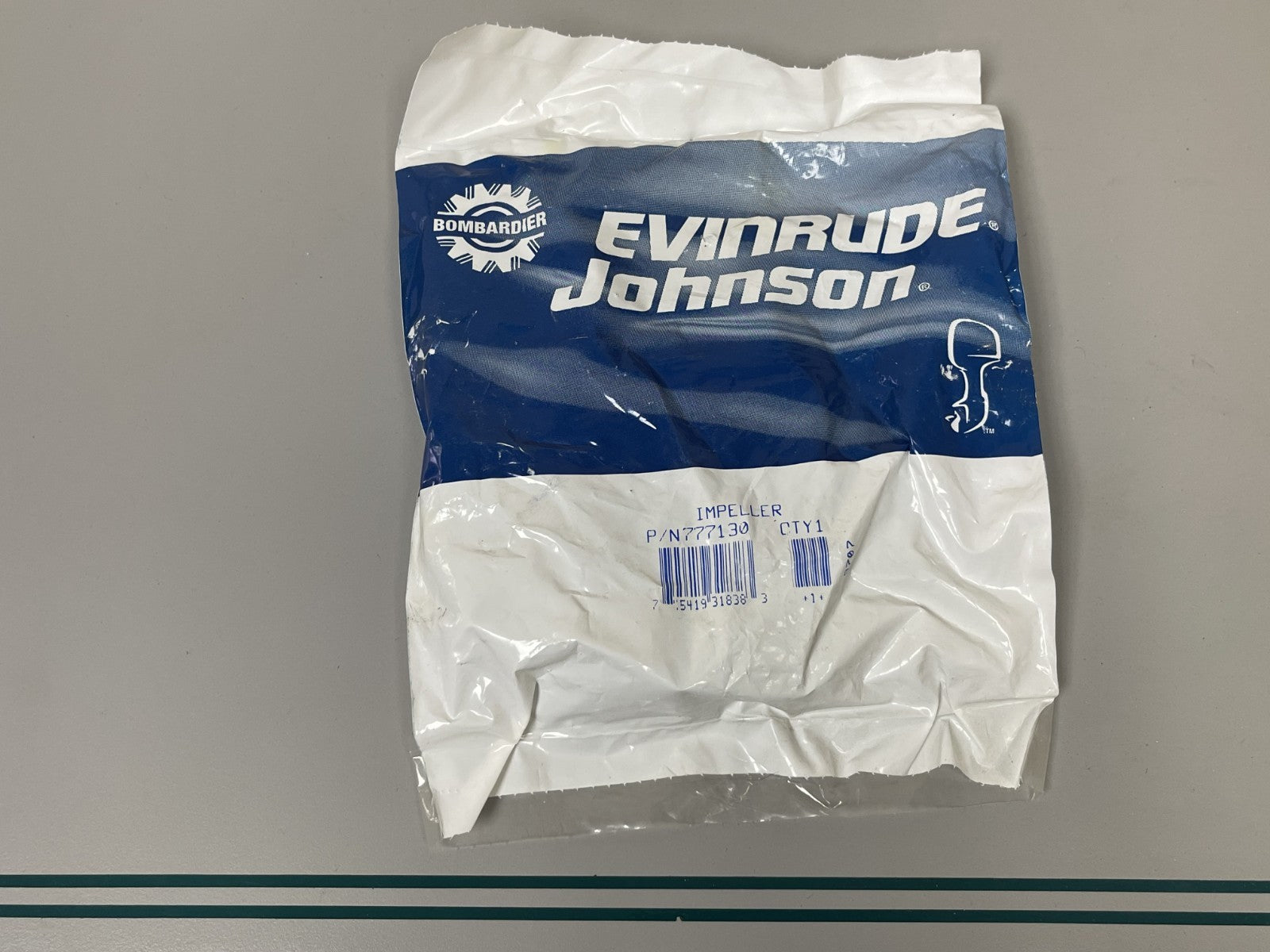 NEW OEM 777130 Johnson Evinrude Impeller 0670
