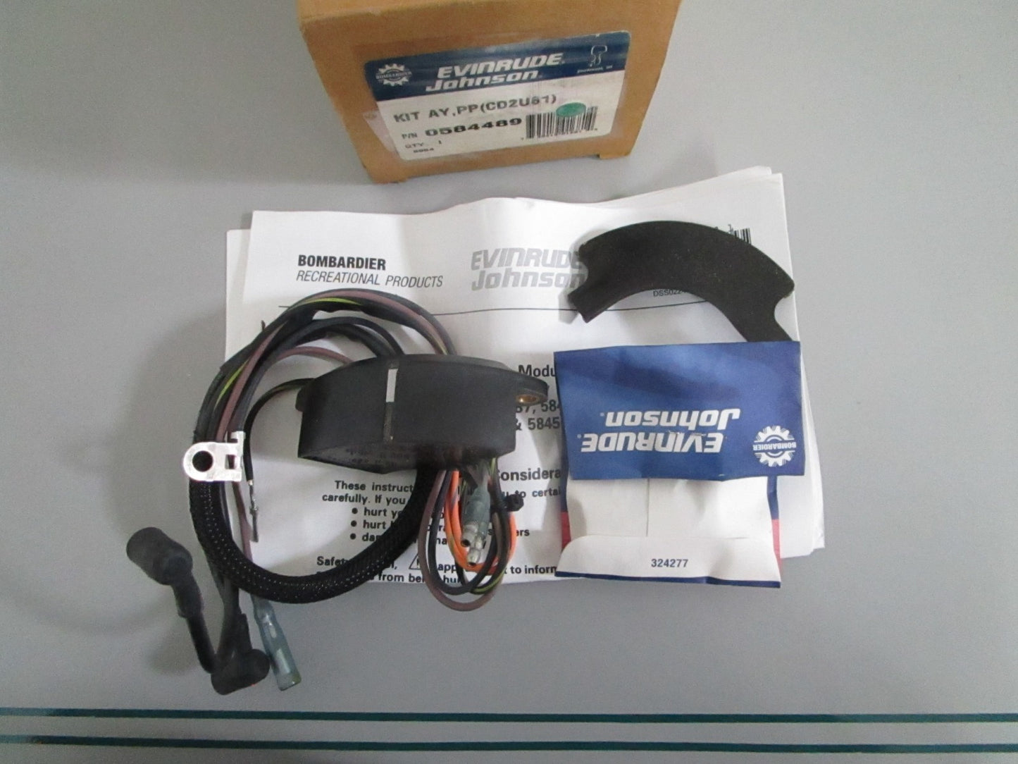 NEW OEM 584489 0584489 OMC Johnson Evinrude Power Pack (CD2U61) Kit Assy 0820