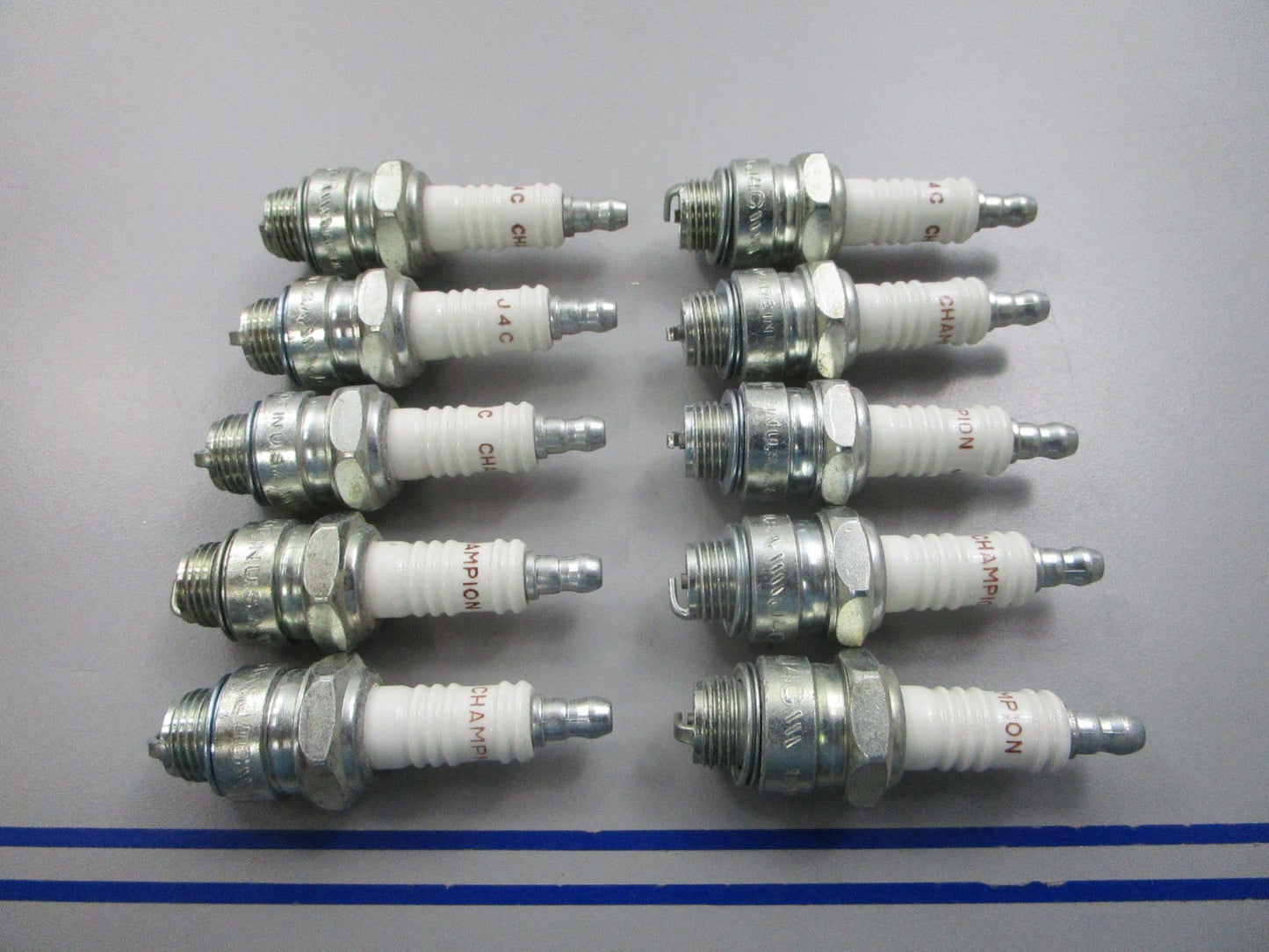 NEW (LOT OF 10) J4C Champion Spark Plug 0810