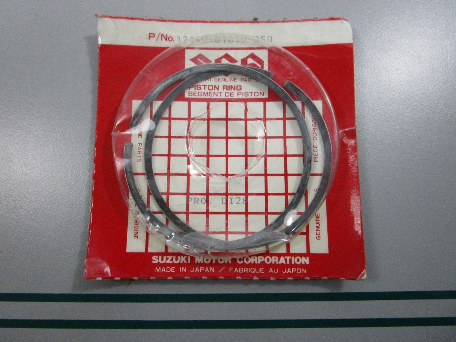 NEW OEM 12140-01C10-050 Suzuki Piston Ring Set 0810
