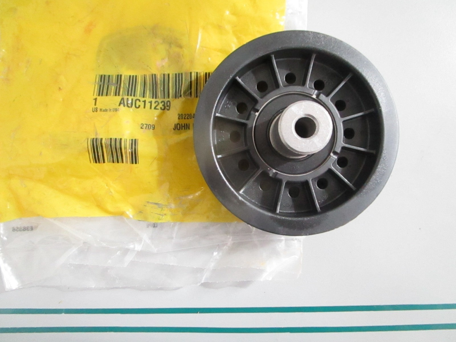 NEW OEM AUC11239 John Deere Idler Pulley 0820