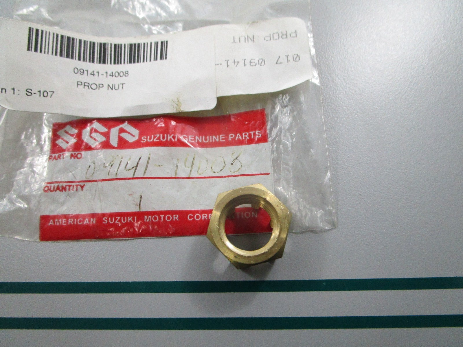 NEW OEM 09141-14008 Suzuki Propeller Nut 0810