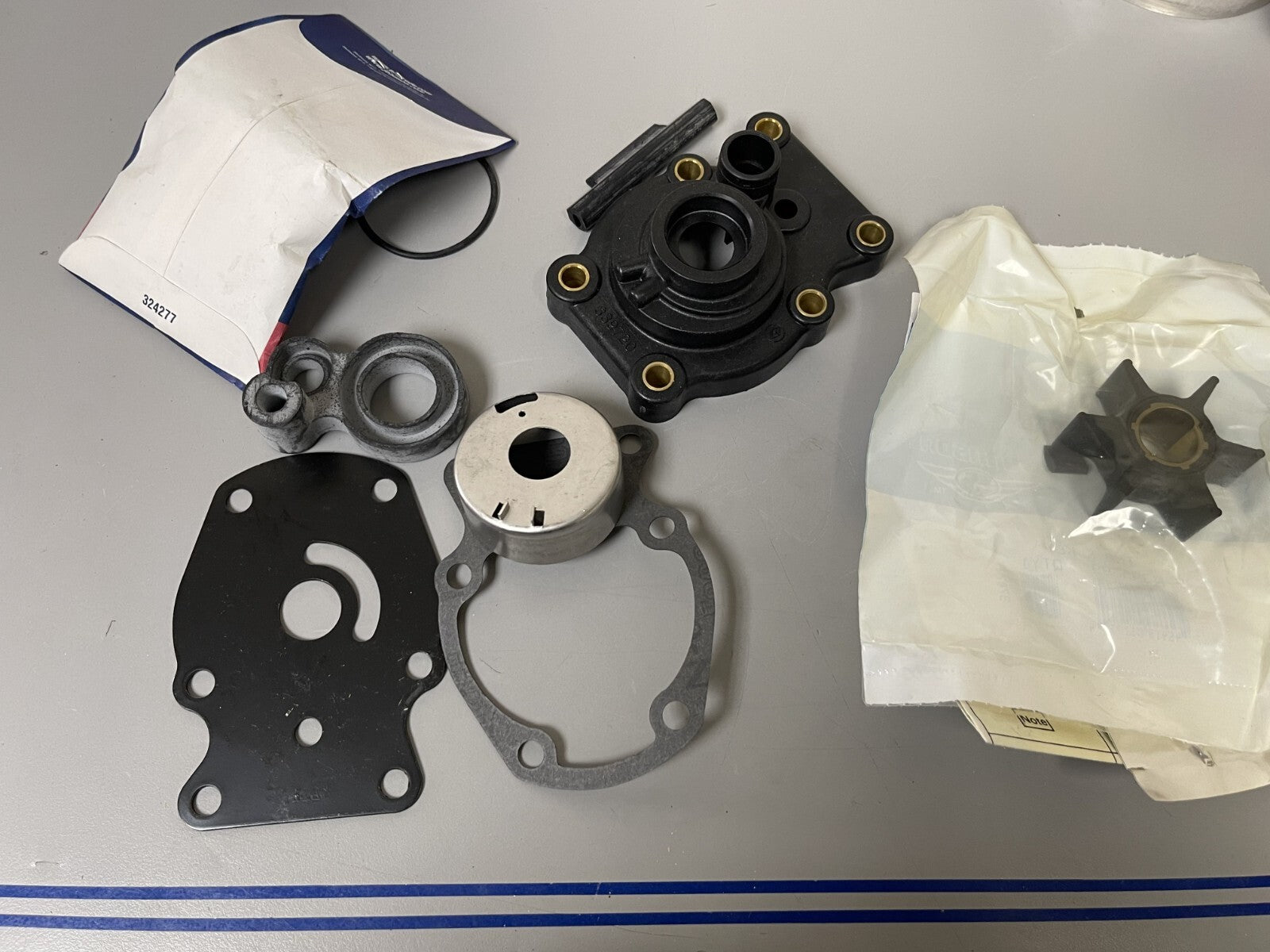 *NEW OEM* 0670 Johnson Evinrude Water Pump Kit 0437907 437907