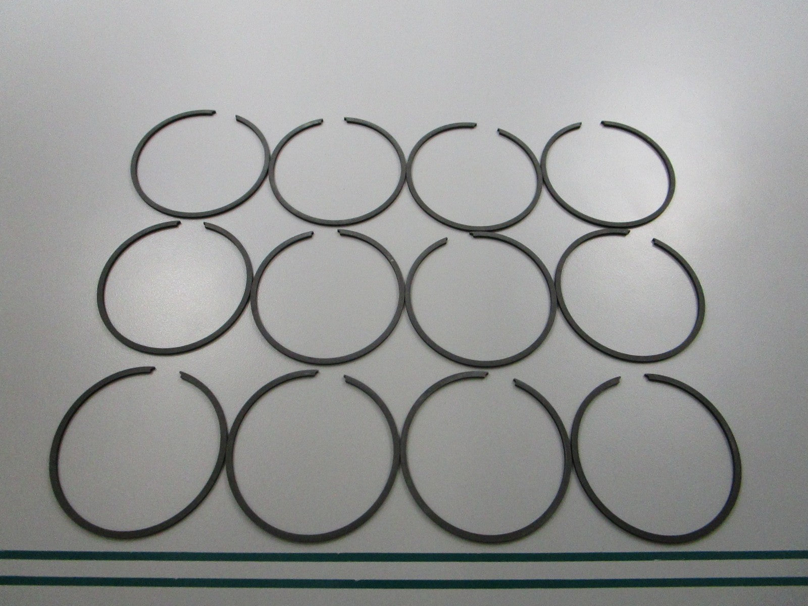 NEW OEM 39-87261A12 Mercury Quicksilver 12 Piston Ring Set 0810