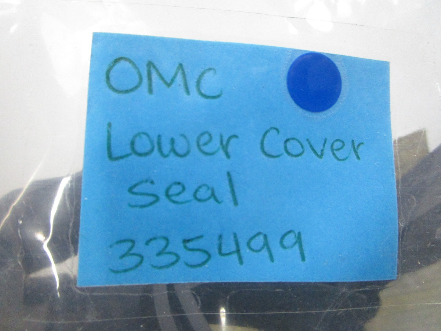NEW OEM 335499 0335499 OMC Johnson Evinrude Lower Cover Seal 0810