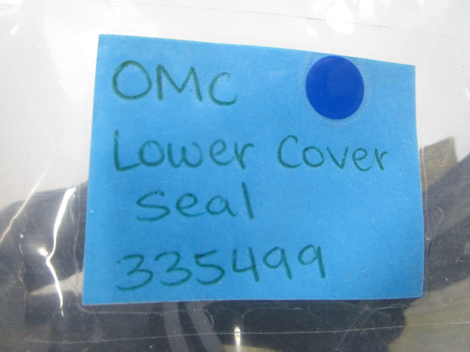 NEW OEM 335499 0335499 OMC Johnson Evinrude Lower Cover Seal 0810