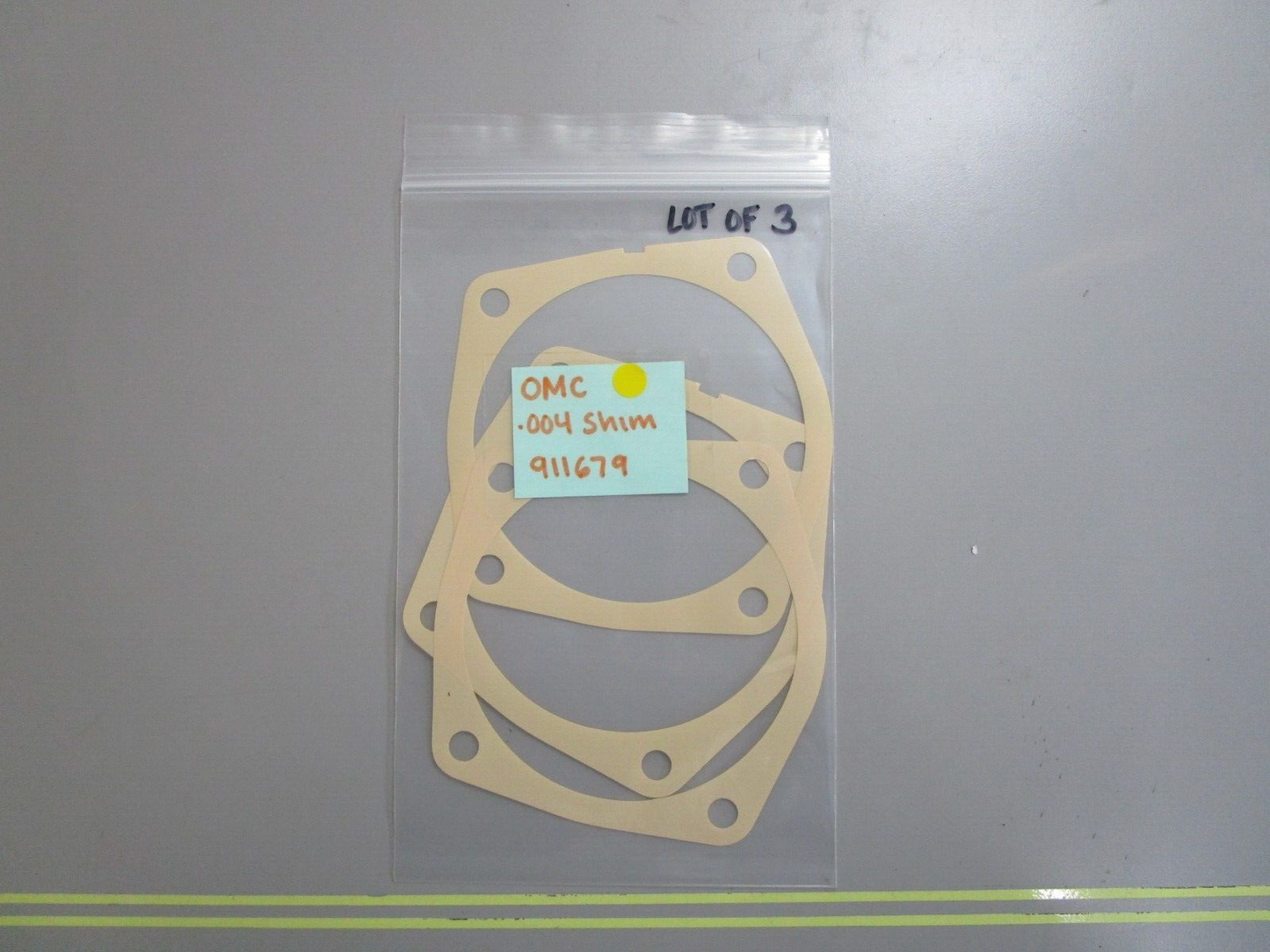 *NEW OEM* (LOT OF 3) 0810 OMC Johnson Evinrude .004 Shim 911679 0911679