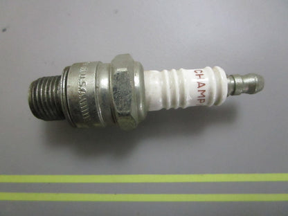 *NEW* 0810 Champion Spark Plug UL77V