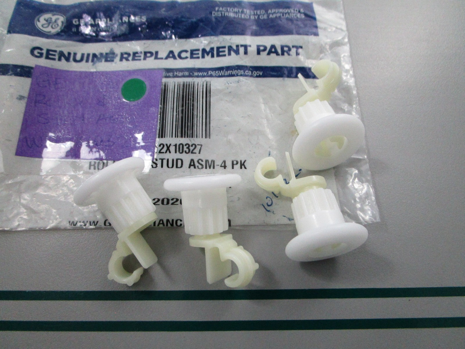 NEW OEM WD12X10327 GE Roller & Stud Assembly 0810