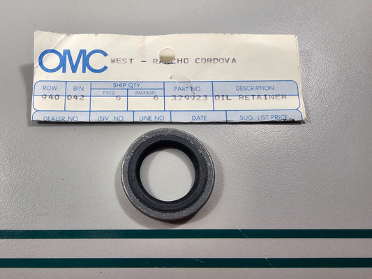 NEW OEM 329923 0329923 OMC Johnson Evinrude Oil Retainer 0810