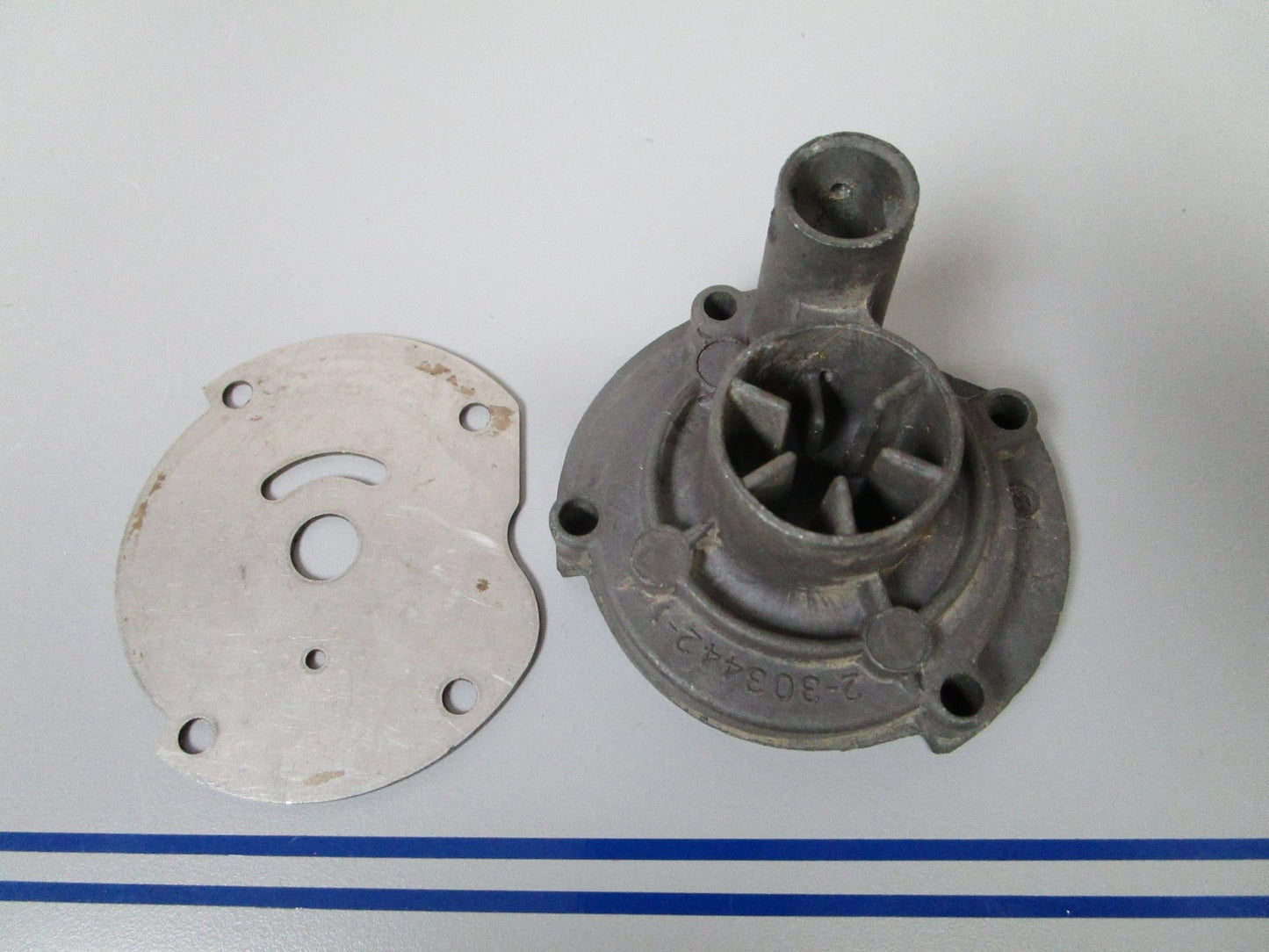 NEW OEM 303442 0303442 OMC Johnson Evinrude Impeller Housing & Plate 0720