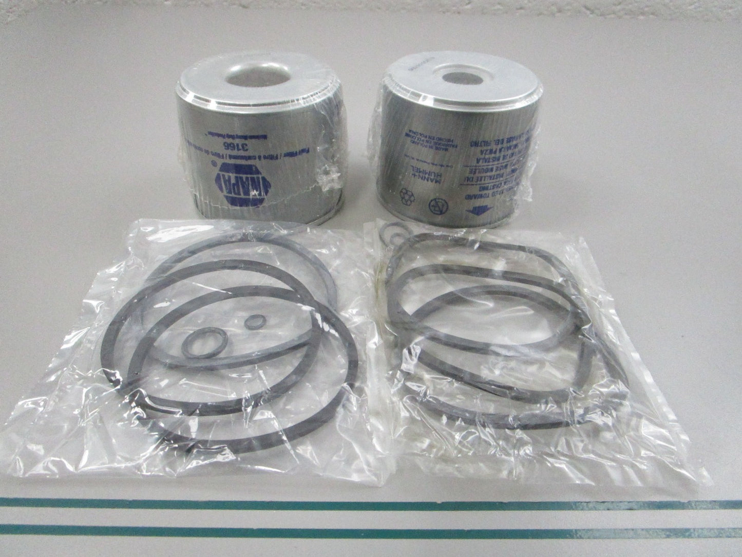 NEW (LOT OF 2) 3166 Napa Fuel Filter 0810