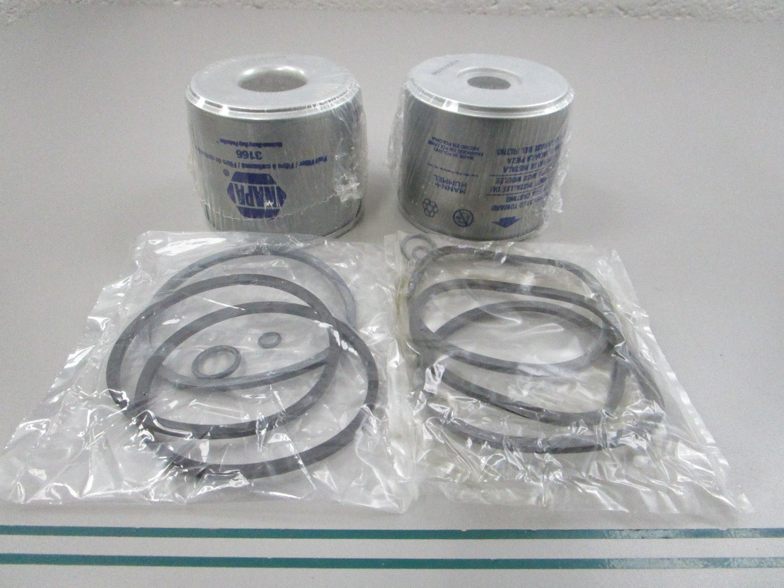 NEW (LOT OF 2) 3166 Napa Fuel Filter 0810