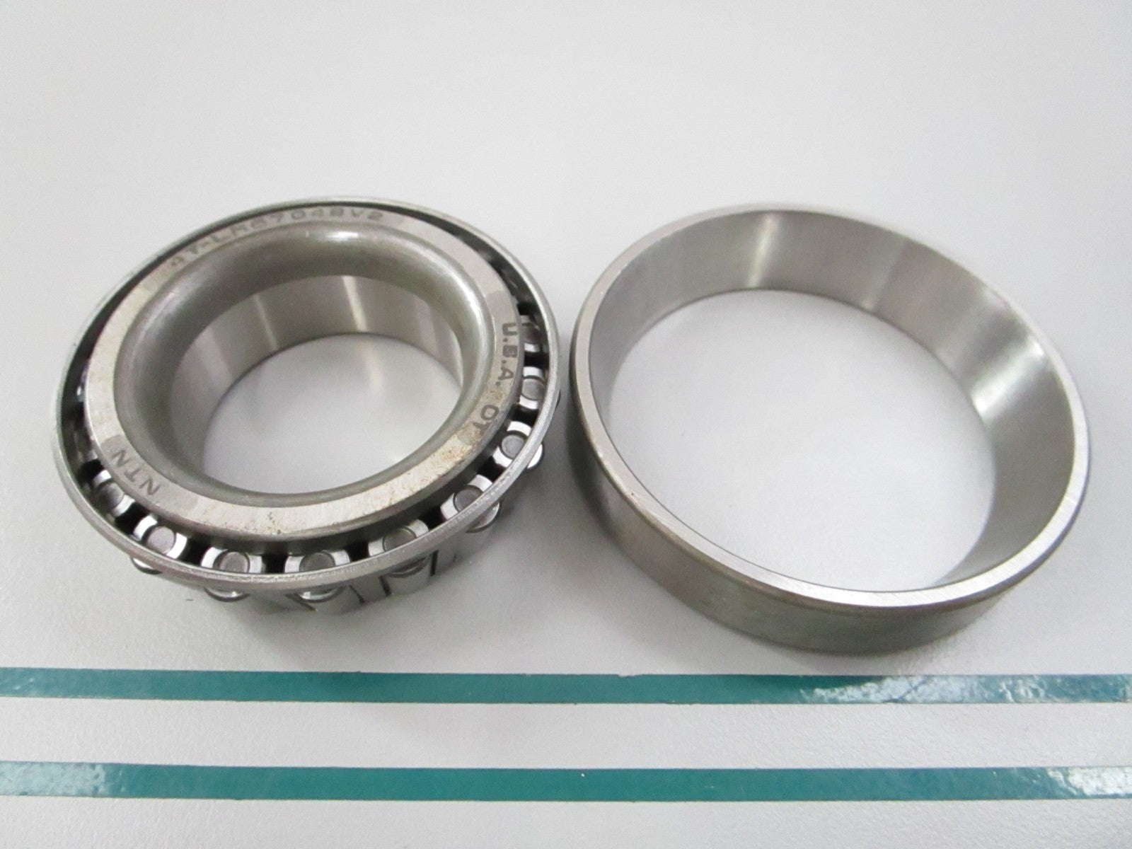 NEW 4T-LM67048V2 4T-LM67010 NTN Tapered Roller Bearing 0810