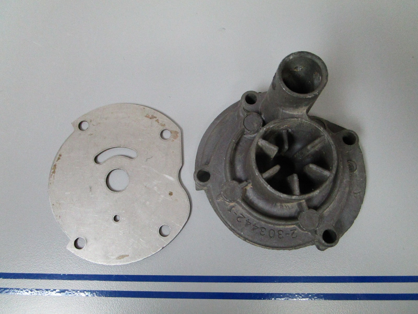NEW OEM 303442 0303442 OMC Johnson Evinrude Impeller Housing & Plate 0720