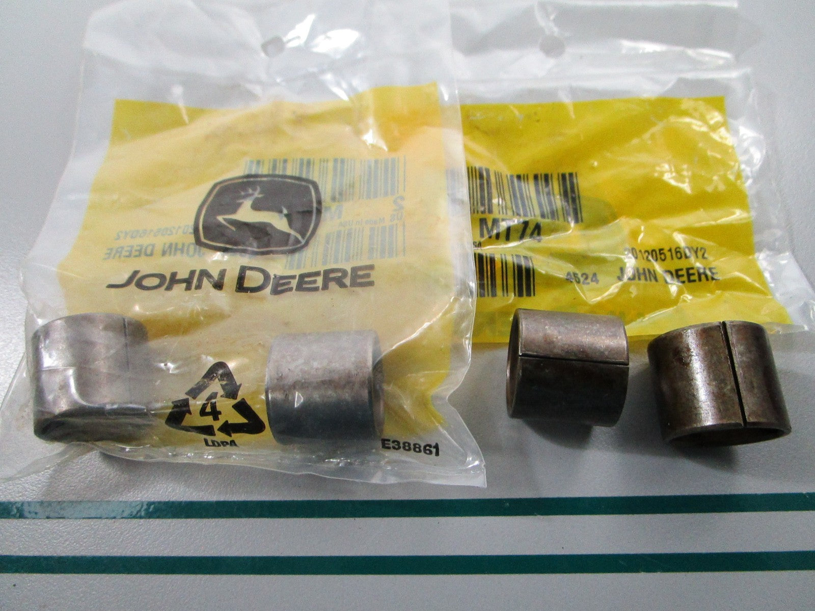 NEW OEM (LOT OF 2) MT74 John Deere 2 Bushing Set 0810