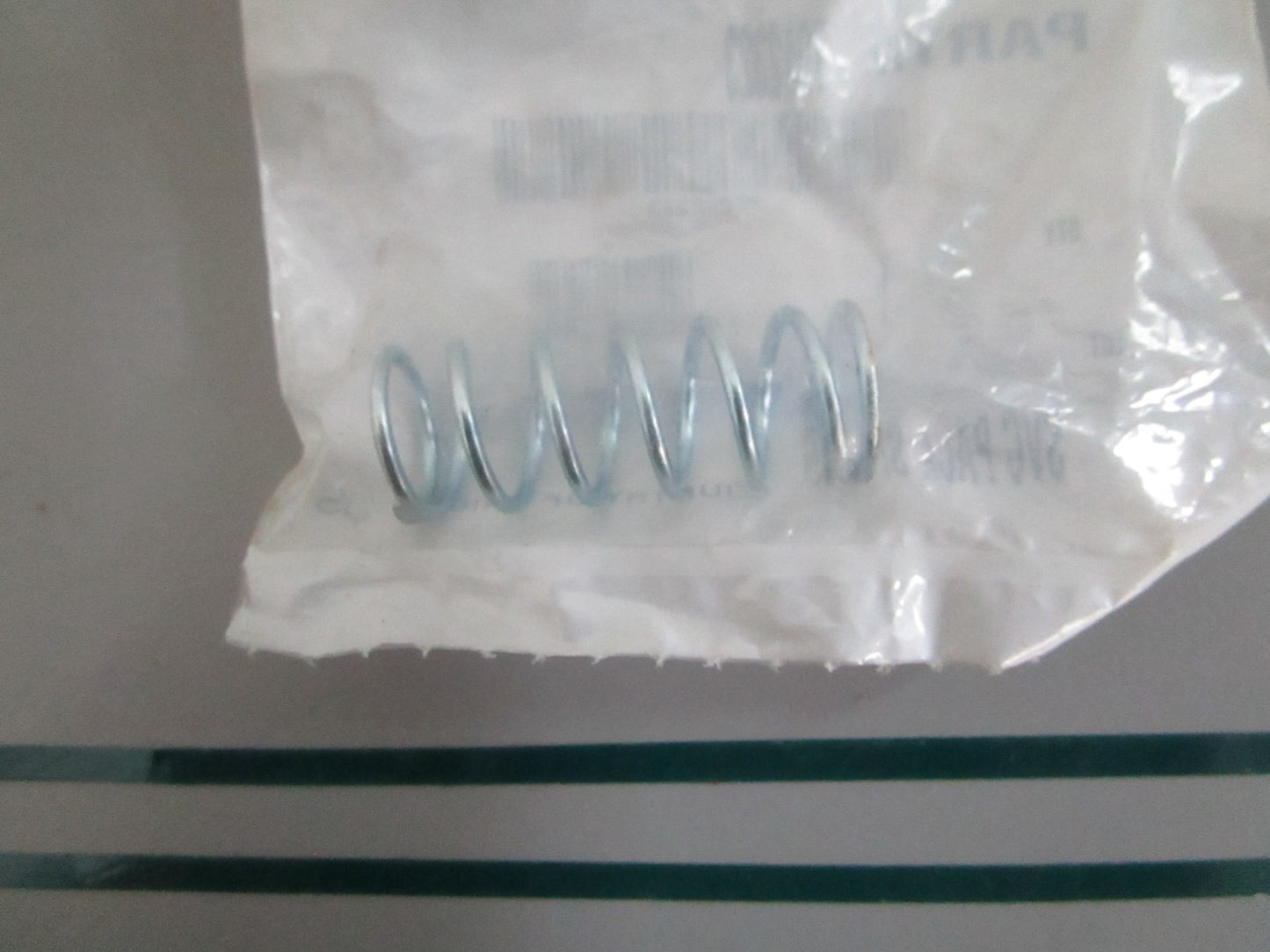 Polaris NEW OEM Spring 7042323 NOS Genuine Factory Powersport Part 0820