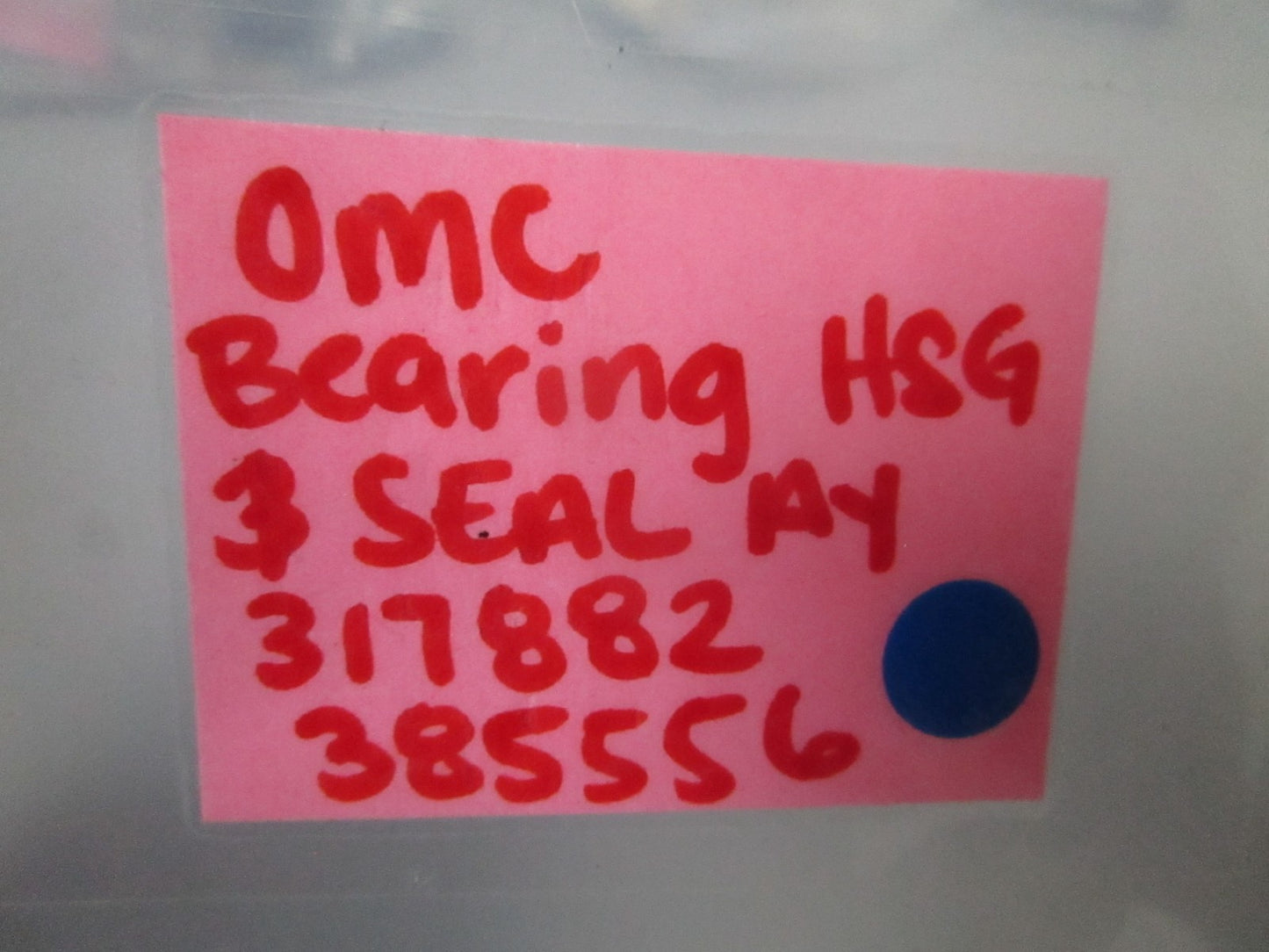 NEW OEM 317882 385556 OMC Johnson Evinrude Bearing Housing & Seal 0720