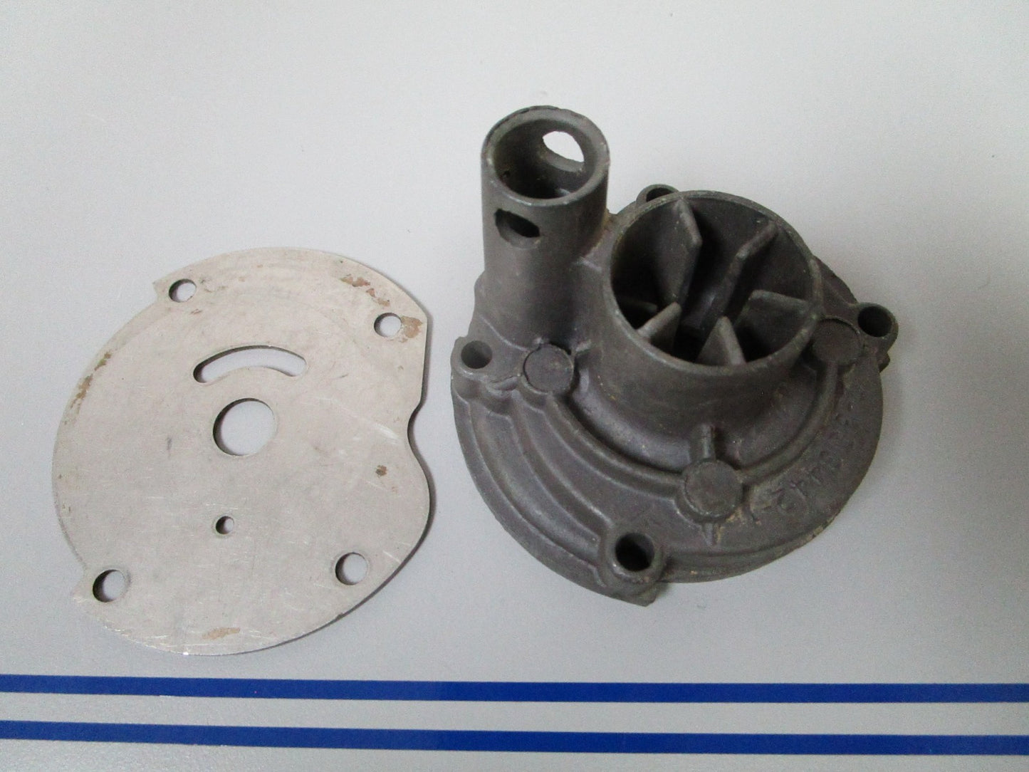 NEW OEM 303442 0303442 OMC Johnson Evinrude Impeller Housing & Plate 0720