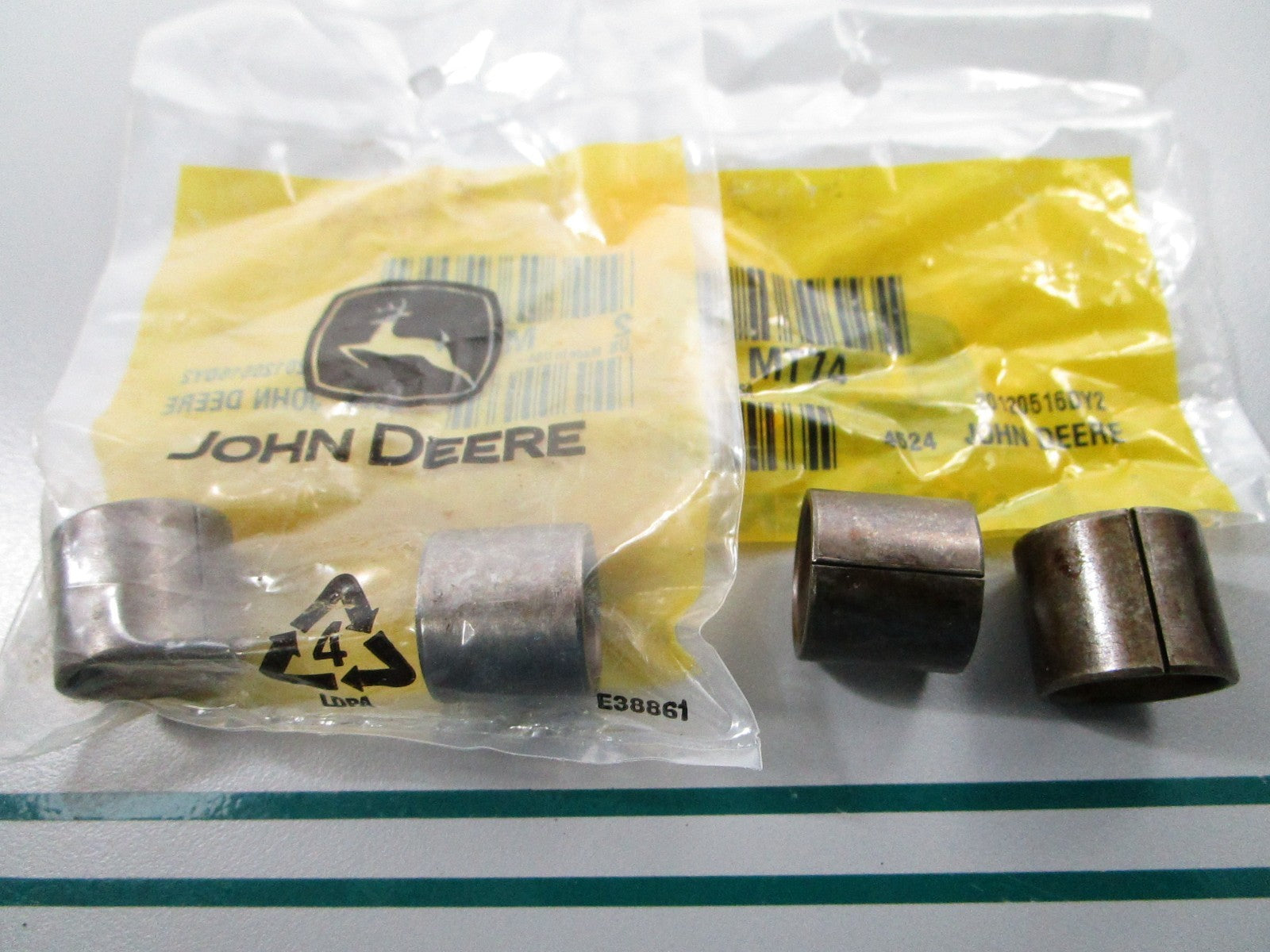NEW OEM (LOT OF 2) MT74 John Deere 2 Bushing Set 0810