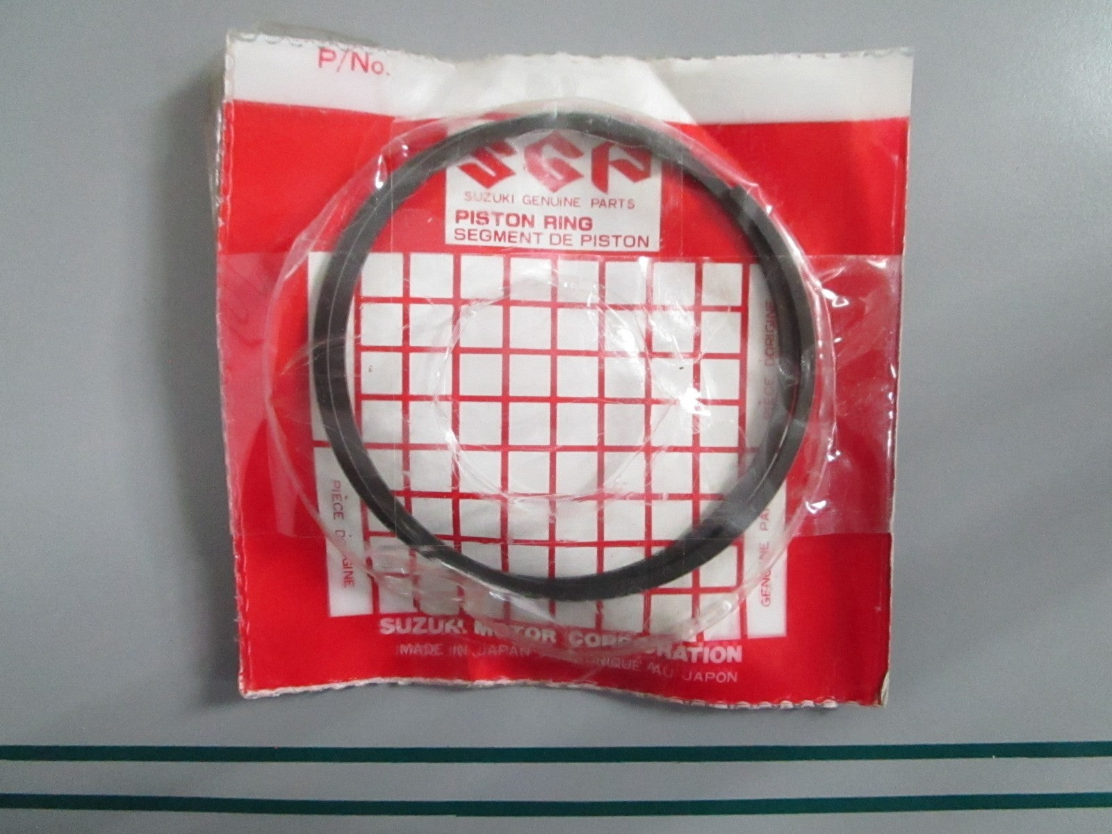NEW OEM 12140-94400-050 Suzuki Piston Ring Set 0820