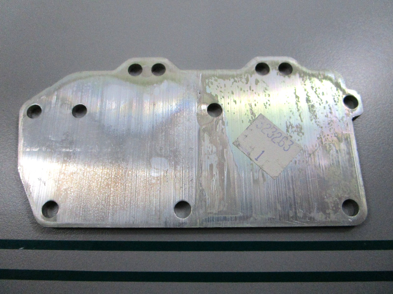 NEW OEM 323263 0323263 OMC Johnson Evinrude Exhaust Plate Cover 0810