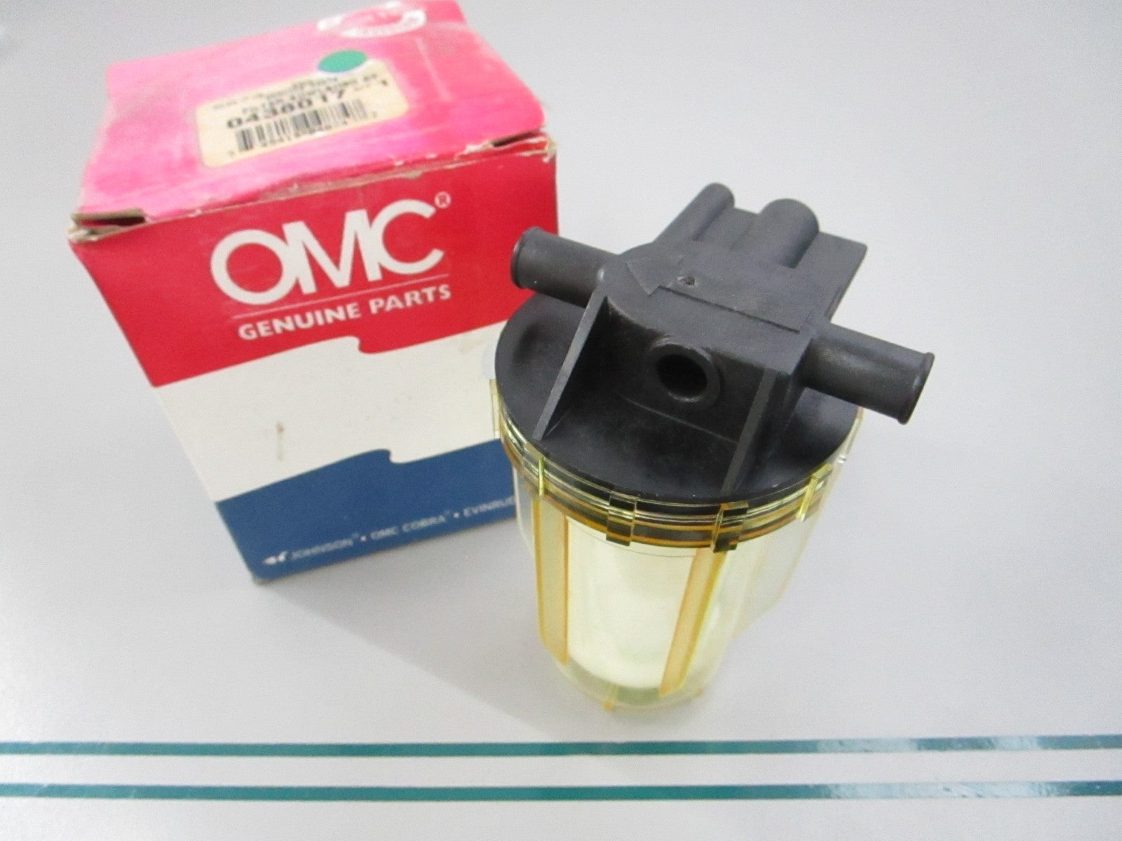 NEW OEM 438017 0438017 OMC Johnson Evinrude Bowl & Housing Filter Ay 0810