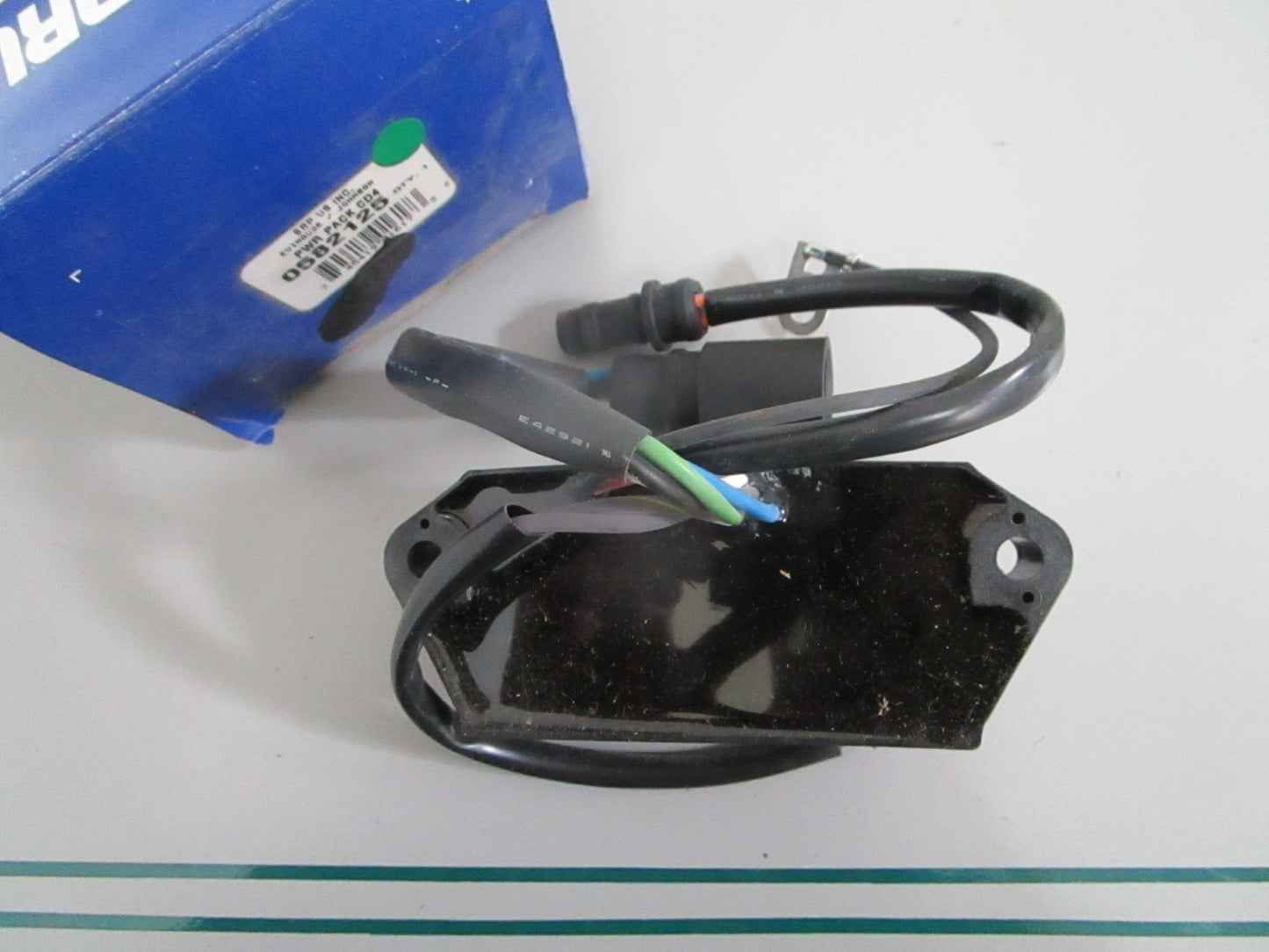 NEW OEM 582125 0582125 OMC Johnson Evinrude Power Pack 0820