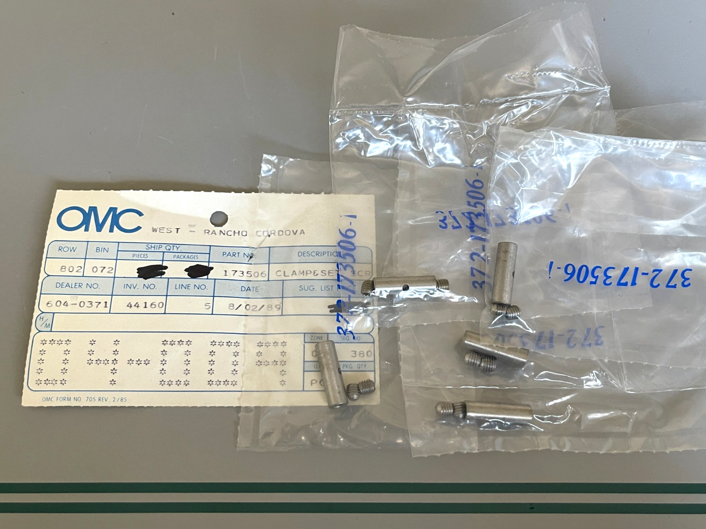 NEW OEM (LOT OF 5) 173506 0173506 OMC Johnson Evinrude Clamp & Screw Set 0810