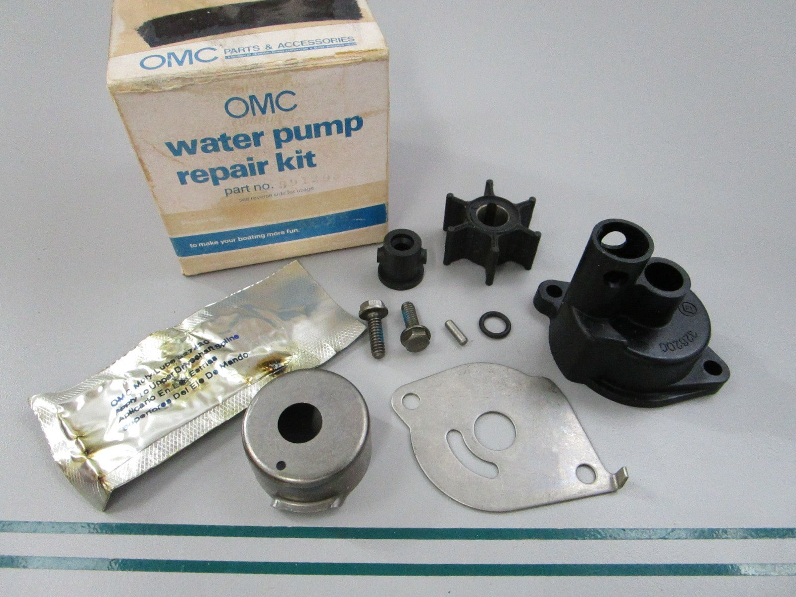 NEW OEM 391293 0391293 OMC Johnson Evinrude Water Pump Repair Kit 0810