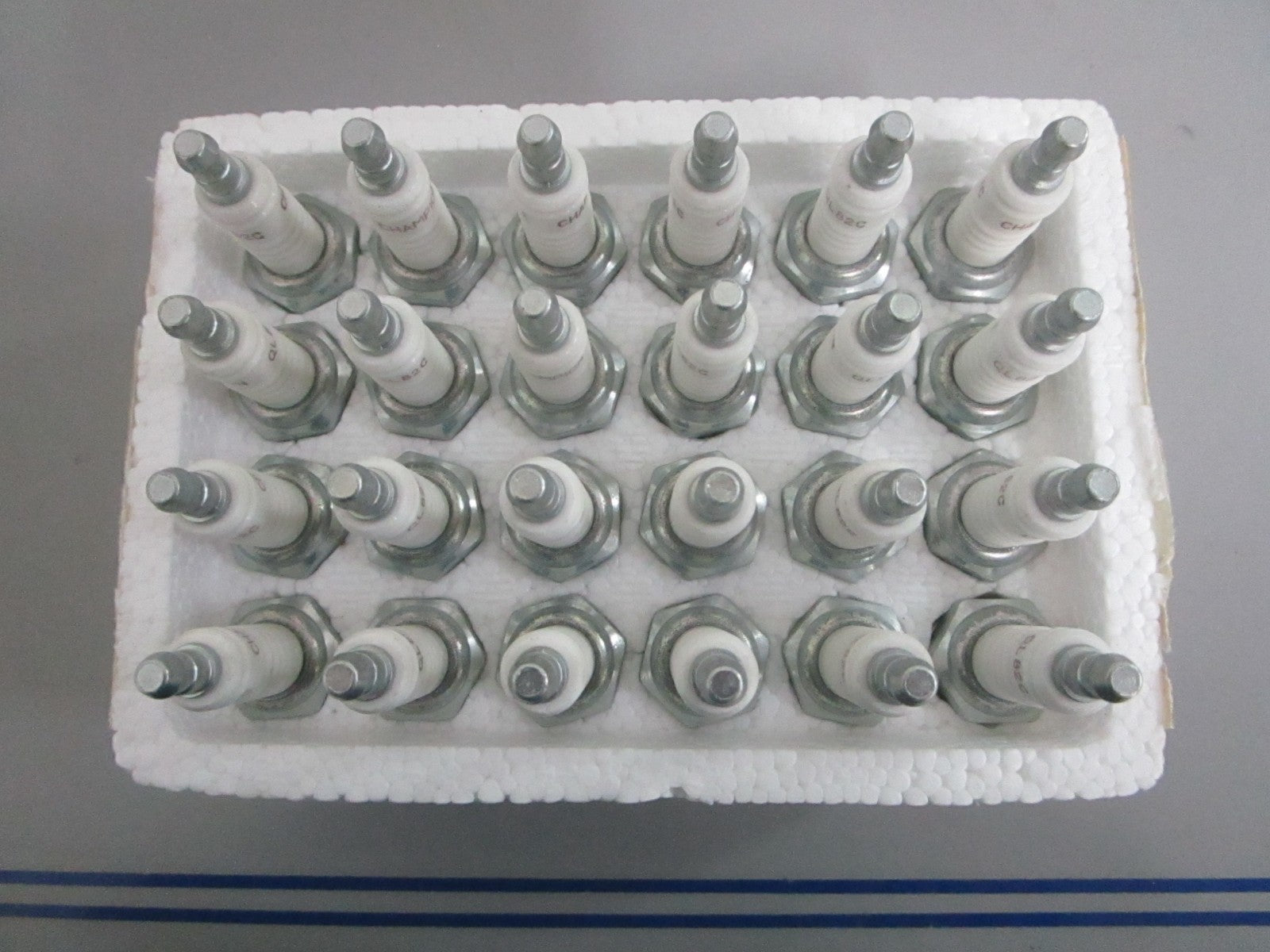 NEW OEM (LOT OF 24) QL82C Champion Spark Plug 0820
