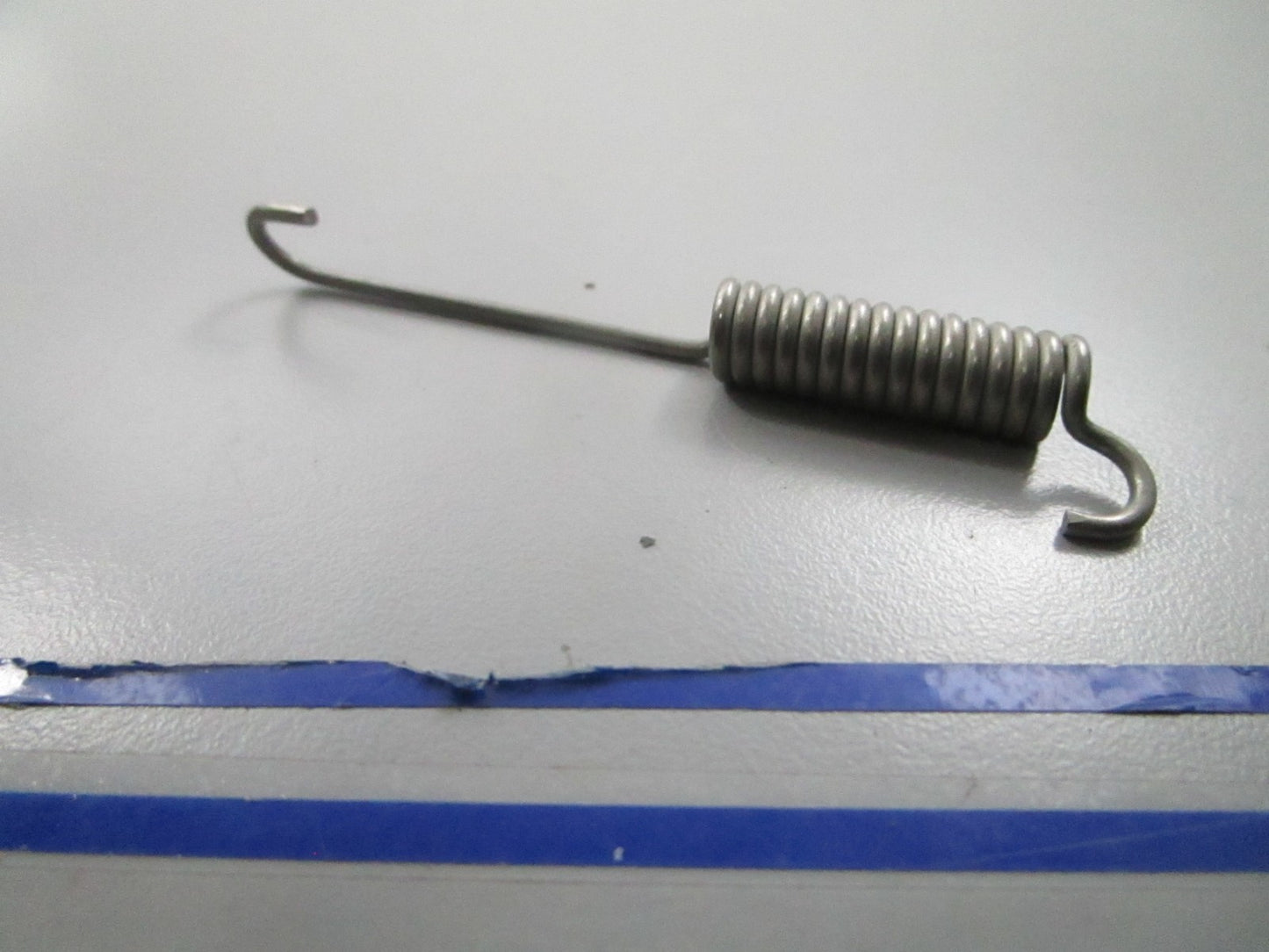 *NEW OEM* 0810 OMC Johnson Evinrude Trail Lock Spring 323142 0323142