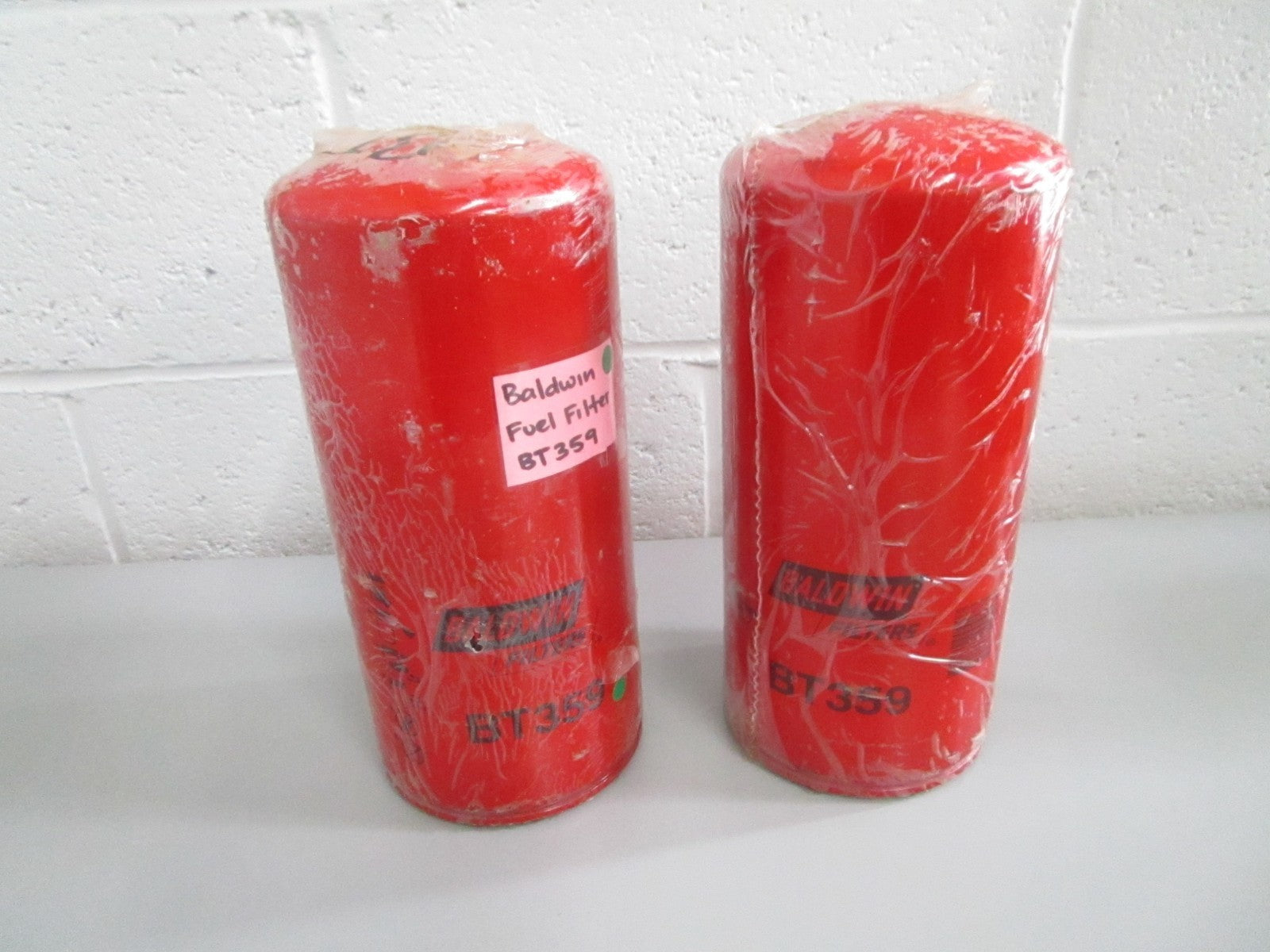 NEW OEM (LOT OF 2) BT359 Baldwin Fuel Filter 0820