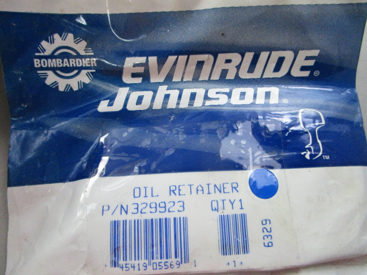 NEW OEM 329923 0329923 OMC Johnson Evinrude Oil Retainer 0810