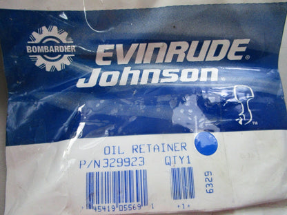 NEW OEM 329923 0329923 OMC Johnson Evinrude Oil Retainer 0810