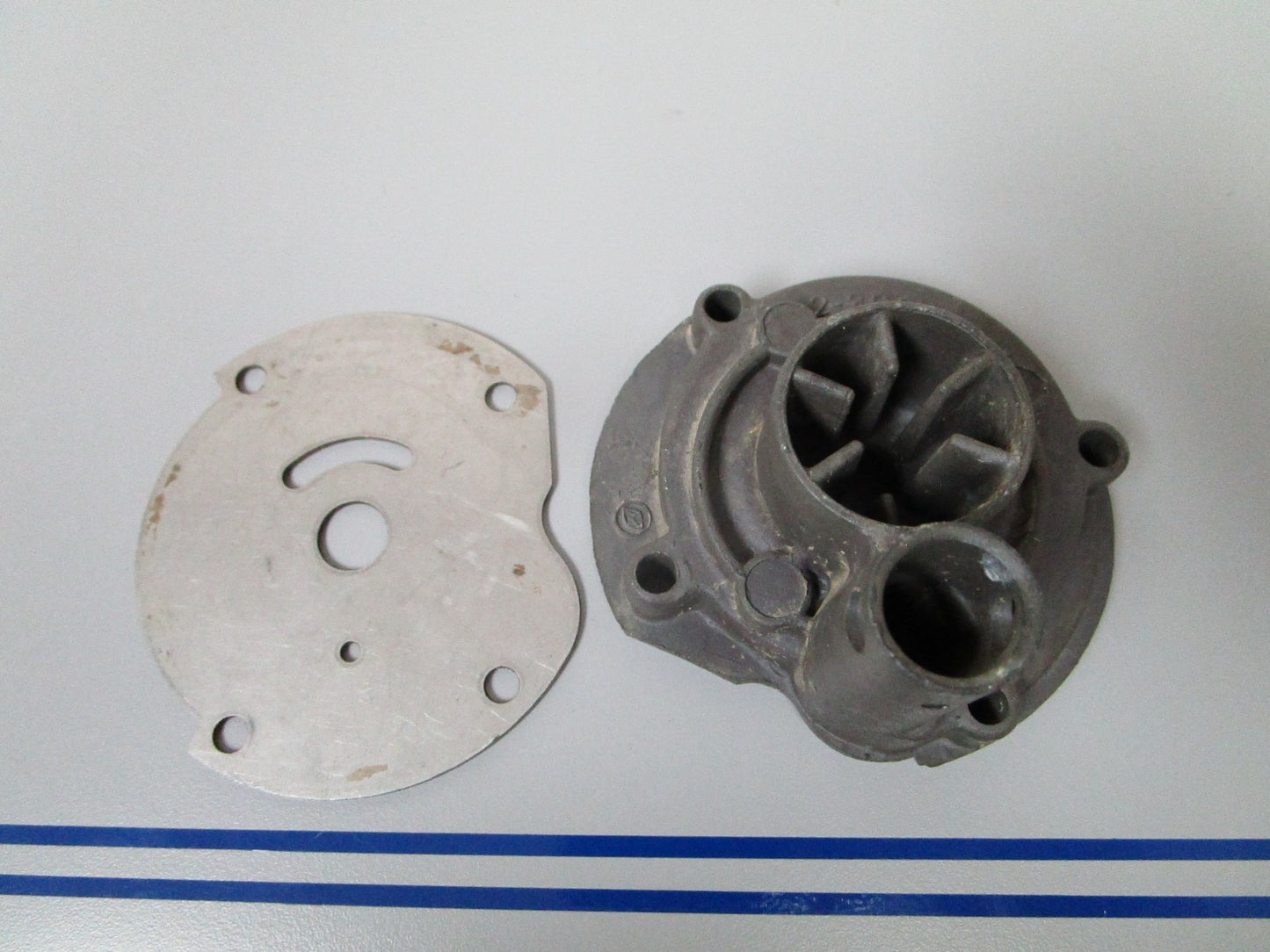 NEW OEM 303442 0303442 OMC Johnson Evinrude Impeller Housing & Plate 0720