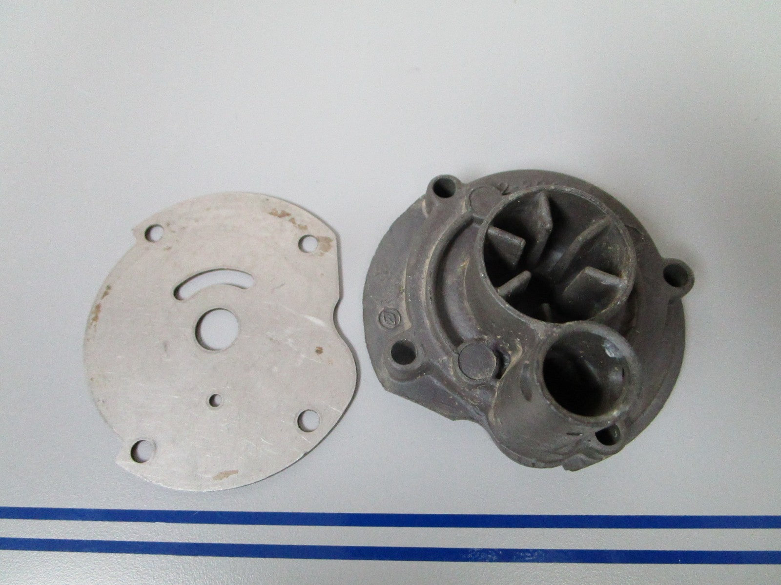 NEW OEM 303442 0303442 OMC Johnson Evinrude Impeller Housing & Plate 0720