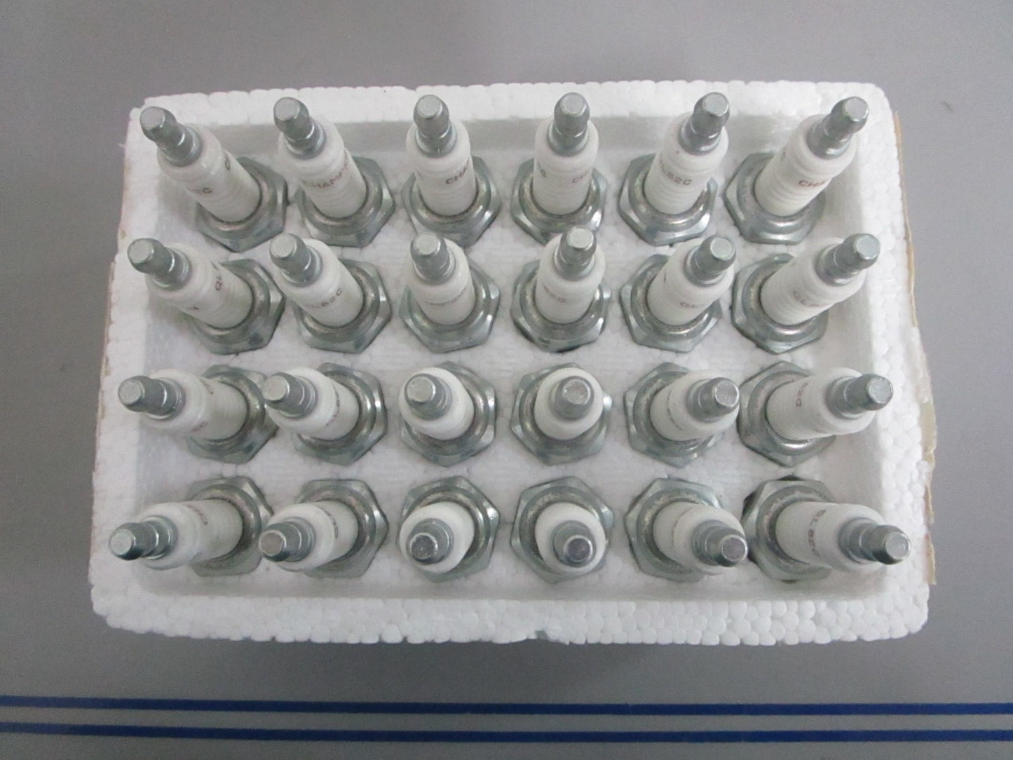 NEW OEM (LOT OF 24) QL82C Champion Spark Plug 0820
