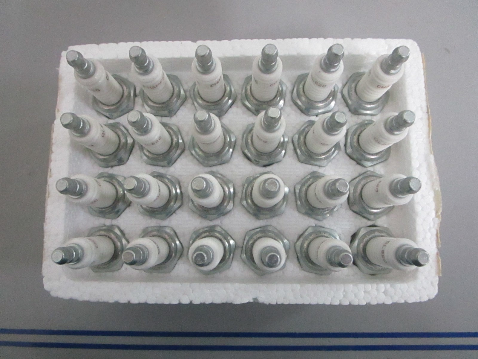 NEW OEM (LOT OF 24) QL82C Champion Spark Plug 0820