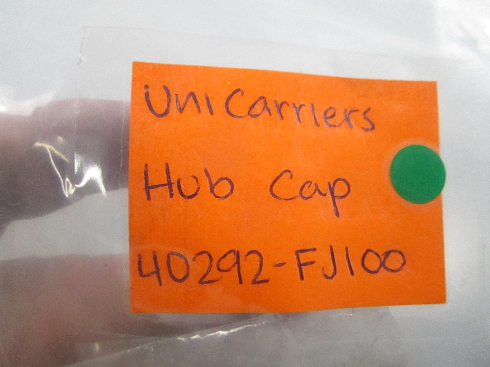 NEW OEM 40292-FJ100 UniCarriers Hub Cap 0810