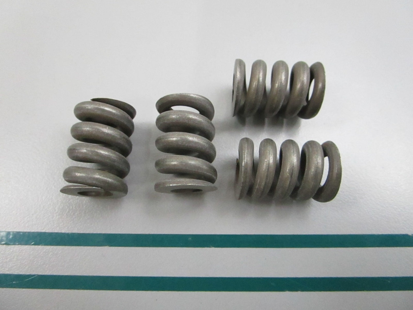 NEW OEM (LOT OF 4) 309825 0309825 OMC Johnson Evinrude Friction Spring 0810