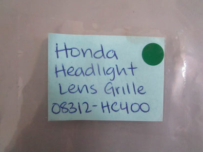 NEW OEM 08312-HC400 Honda Headlight Lens Grille 0820