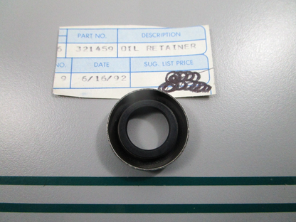 NEW OEM 321459 0321459 OMC Johnson Evinrude Oil Retainer 0810
