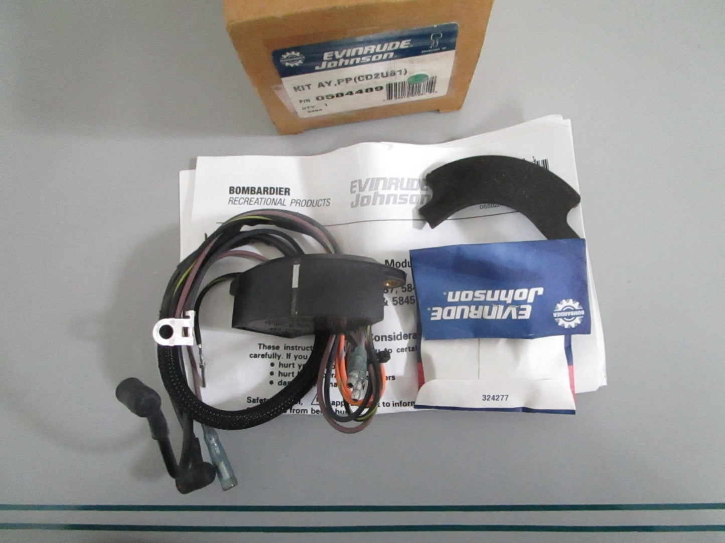 NEW OEM 584489 0584489 OMC Johnson Evinrude Power Pack (CD2U61) Kit Assy 0820